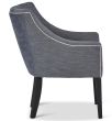 Chantelle Chair featuring button back in Wortley Maison Neptune grey fabric with additional white contrast piping