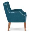 Wellington chair featuring buttoned back, Warwick fabric and optional contrast piping