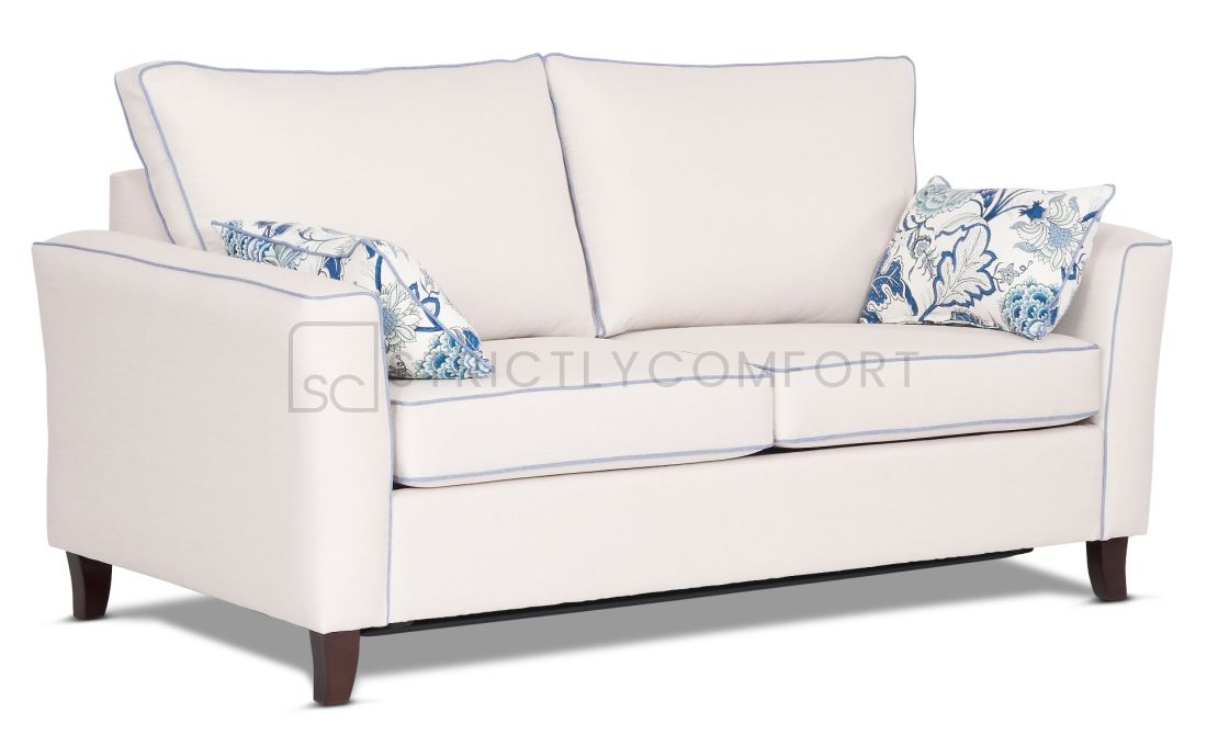 Caprice double sofa bed featuring Zepel Tonga range in light cream and additional blue contrast piping
