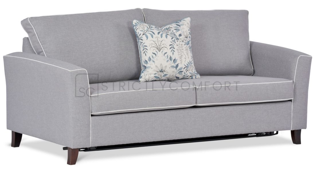 Caprice Queen Sofa bed featuring Warwick Keylargo fabric and additional contrast white piping.