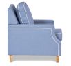 Hampton armchair featuring Zepel Tonga Spa light blue fabric with optional contrast white piping