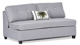 Neo 2.5 seater armless double sofa bed featuring Wortley Zane Opal fabric with buttons included