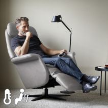 Stressless Sam Recliner with Sirius Base and leather panels on the arms