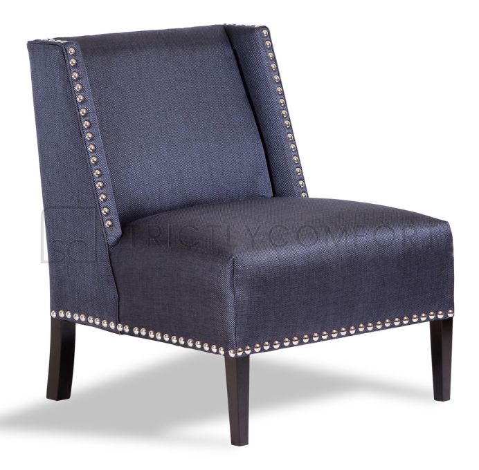 The Vogue chair featuring  Zepel Fabric and chrome studs