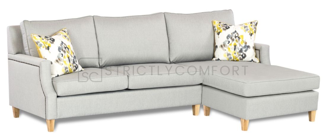 Hampton Sofa bed modular featuring Warwick Vegas fabric with Antique Bronze Studs