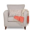 The Caprice Armchair with scatter cushion and throw