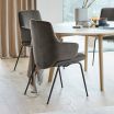 Stressless Laurel Dining Chair with Arms, Low Back and D300 Legs in Rose Mole fabric and Matte Black metal