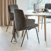 Stressless Laurel Dining Chair with Arms, Low Back and D300 Legs in Rose Mole fabric and Matte Black metal