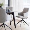 Stressless Laurel Dining Chair with Arms, Low Back and D350 Legs in Clover Light Grey fabric and Matte Black metal