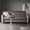 Stressless Fiona Sofa in Paloma Chestnut Leather featuring Polished Metal finish on the arms