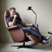 Stressless Sam Recliner with Sirius Base and leather panels on the arms