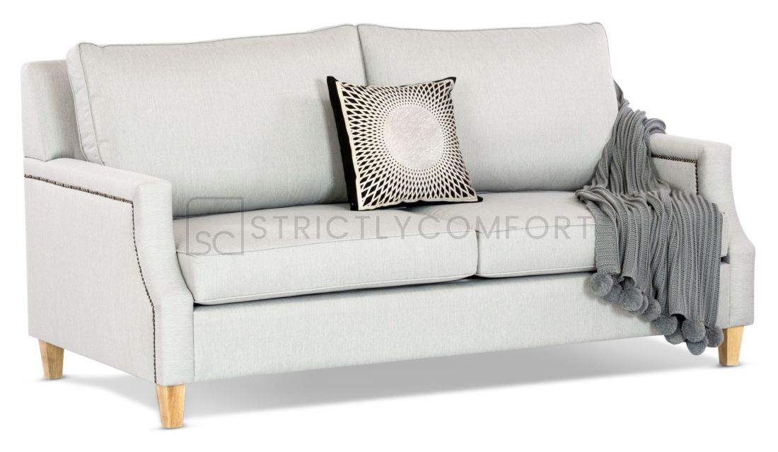 Hampton 3 Seater featuring Warwick Vegas light grey fabric with optional studs