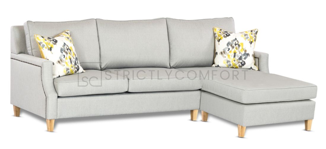 Hampton Modular featuring Warwick Vegas Light Grey fabric with Antique Bronze studs