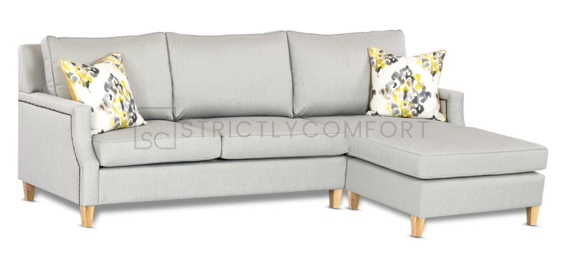 Hampton Modular Featuring Warwick Vegas fabric with Bronze Antique studs