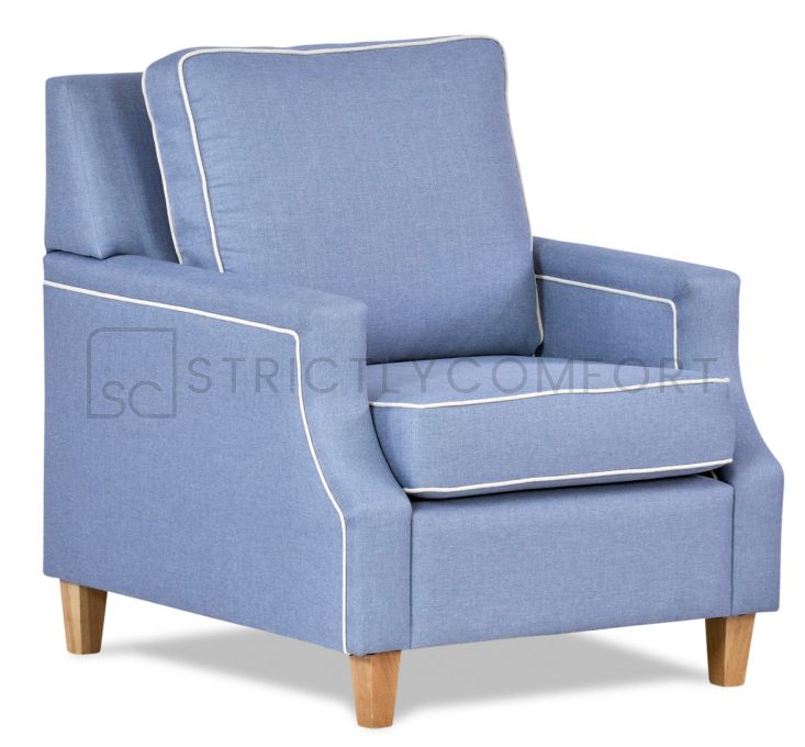 Hampton armchair featuring Zepel Tonga Spa light blue fabric with optional contrast white piping